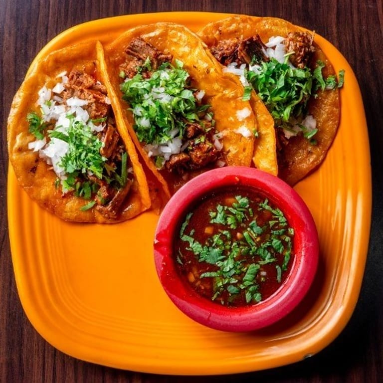 Delicious Birria Tacos Await
